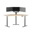 light wood finish standing desk top with slate finish legs in a open office